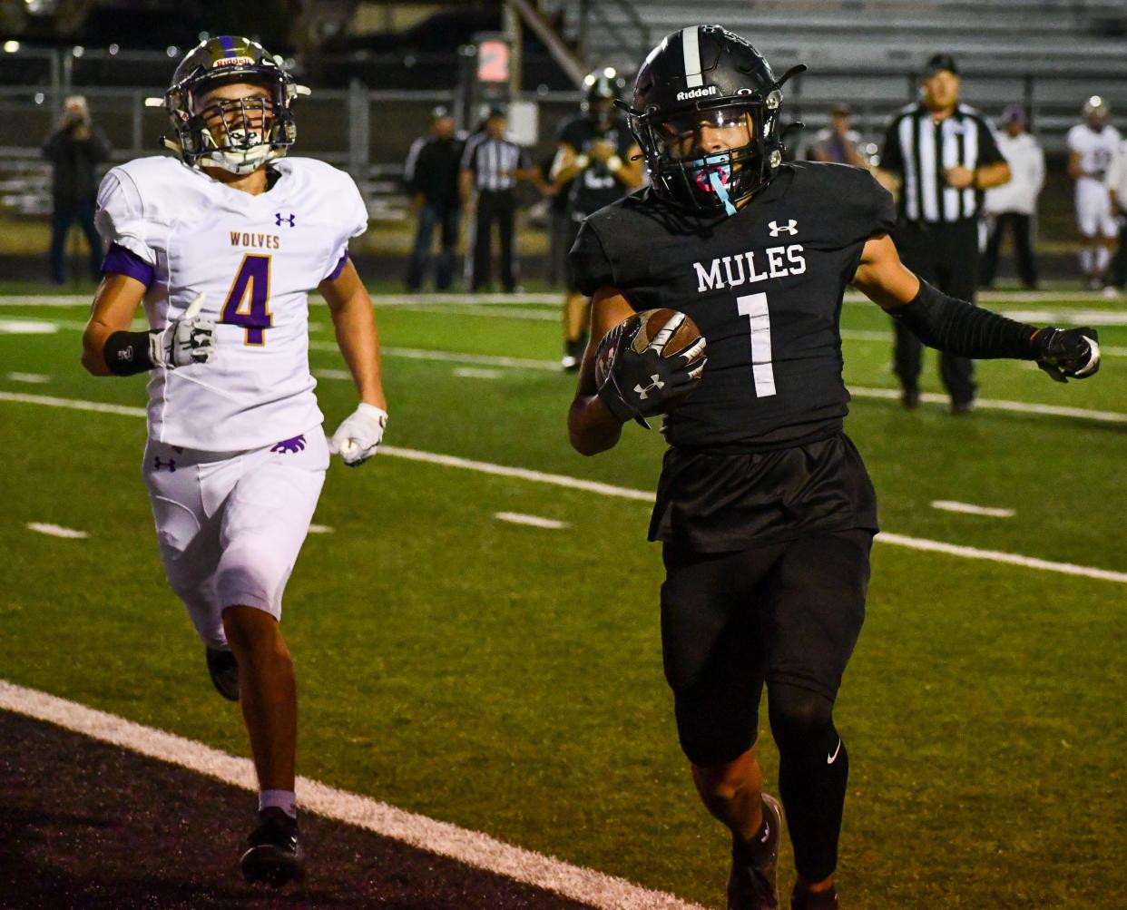 Muleshoe's Irvin Torres beats Dalhart’s Corbin Carnesecca into the end zone for a touchdown on Friday, Oct. 29, 2021, in Muleshoe.