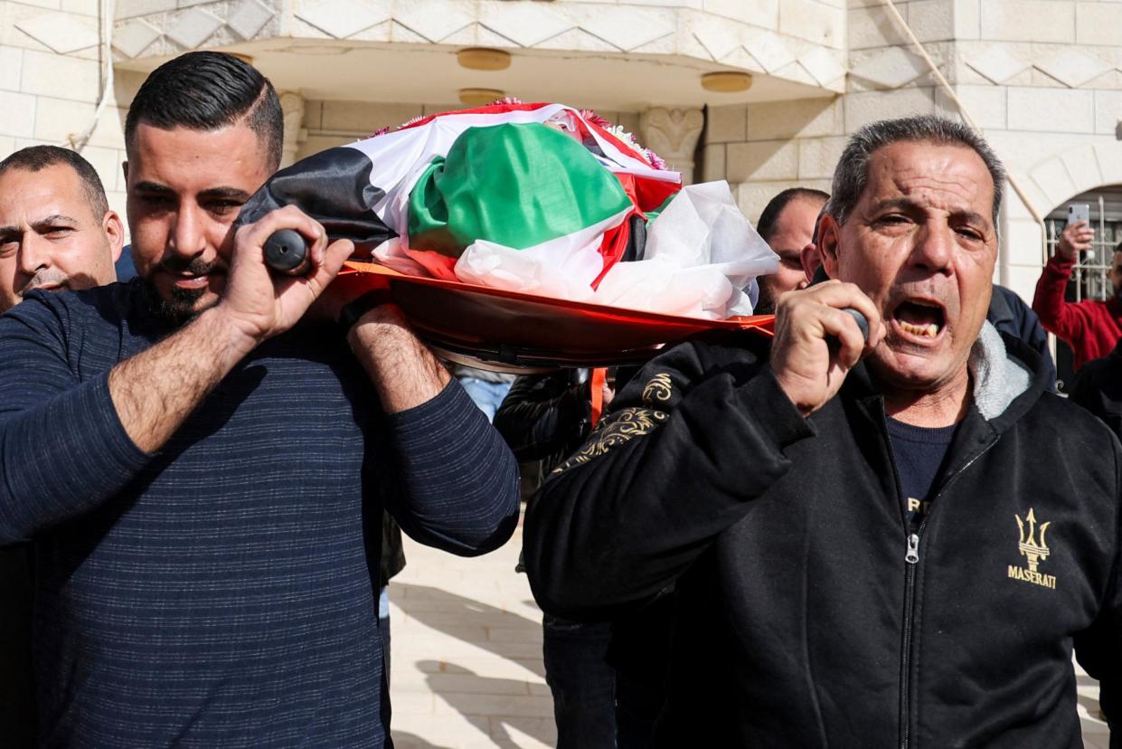 <span>The funeral of Omar Assad, a Palestinian American, who was found dead after being detained and handcuffed during an Israeli raid in the West Bank in January 2022.</span><span>Photograph: Jaafar Ashtiyeh/AFP via Getty Images</span>