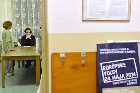 Members of the local electoral commission wait for polling to end at a station during European Parliament elections in Trencin May 24, 2014. REUTERS/Radovan Stoklasa