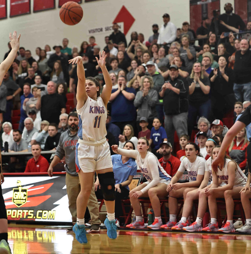 Kings' Madi Barnett (11) shoots the ball during the OHSAA Division I regional semifinal game between Kings and Lakota East Wednesday, March 1, 2023.