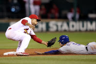 ST LOUIS, MO - OCTOBER 20: Ian Kinsler #5 of the Texas Rangers steals second base ahead of the tag by Rafael Furcal #15 of the St. Louis Cardinals in the ninth inning during Game Two of the MLB World Series at Busch Stadium on October 20, 2011 in St Louis, Missouri. (Photo by Jamie Squire/Getty Images)