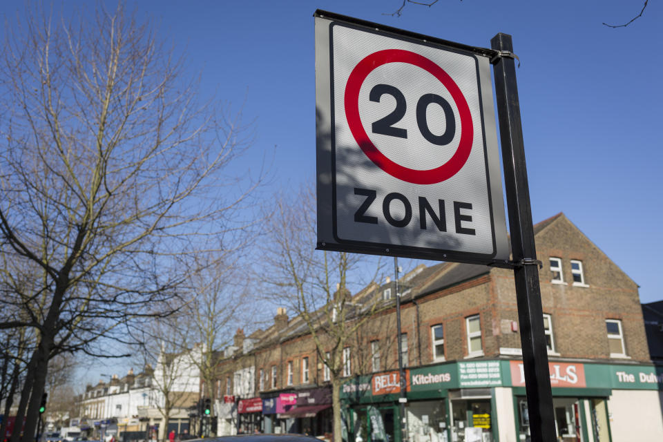 A 20mph speed limit signpost and local shops on Lordship Lane, in East Dulwich, on 15th March 2017, London borough of Southwark, England. (Photo by Richard Baker / In Pictures via Getty Images Images)