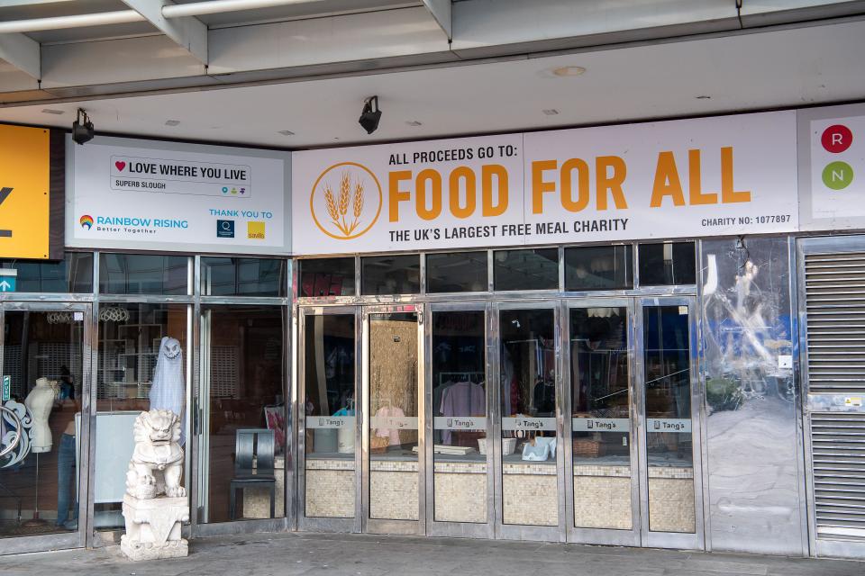 charity Slough, Berkshire, UK. 14th December, 2022. A Food For All, Free Meal Charity shop in Slough. UK Inflation costs came in at slightly less than predicted in November at 10.7% primarily due to the cost of fuel prices lowering, however, the Office for Budget Responsibilty, (OBR) have predicted the biggest fall in living standards in the UK since records began. For the period 2022 to 2023 the fall in real household income is forecast to be 4.3%. Credit: Maureen McLean/Alamy Live News