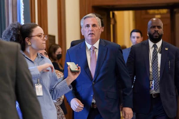 PHOTO: House Minority Leader Kevin McCarthy, is followed by reporter as he walks to his office on Capitol Hill, Aug. 12, 2022.  (Susan Walsh/AP)