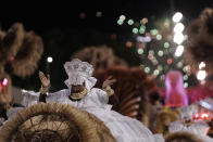 A performer from the Grande Rio samba school parades during Carnival celebrations at the Sambadrome in Rio de Janeiro, Brazil, Monday, Feb. 24, 2020. (AP Photo/Leo Correa)