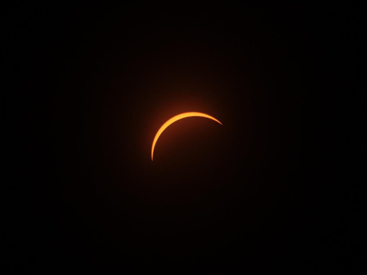 Even with just a sliver of the sun visible, a solar filter was necessary to photograph the solar eclipse Monday in Toledo.