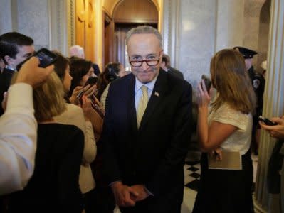 Senator Chuck Schumer (D-NY) walks after the Senate voted to override U.S. President Barack Obama's veto of a bill that would allow lawsuits against Saudi Arabia's government over the Sept. 11 attacks, on Capitol Hill in Washington, U.S., September 28, 2016. REUTERS/Joshua Roberts