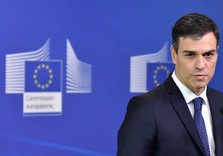 Spanish Prime Minister Pedro Sanchez speaks after arriving to take part in an emergency European Union leaders summit on immigration, in Brussels, Belgium June 24, 2018. REUTERS/Eric Vidal