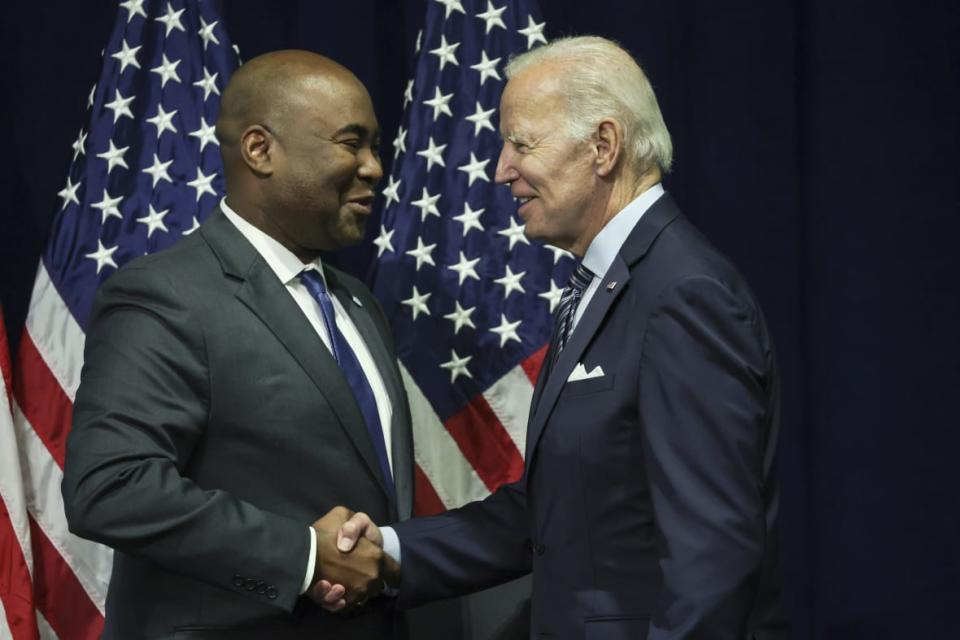 President Joe Biden, right, greets Democratic National Committee Chairman Jaime Harrison at the organization’s summer meeting on Sept. 8, 2022 at the Gaylord National Resort & Convention Center in National Harbor, Maryland. (Photo by Alex Wong/Getty Images)