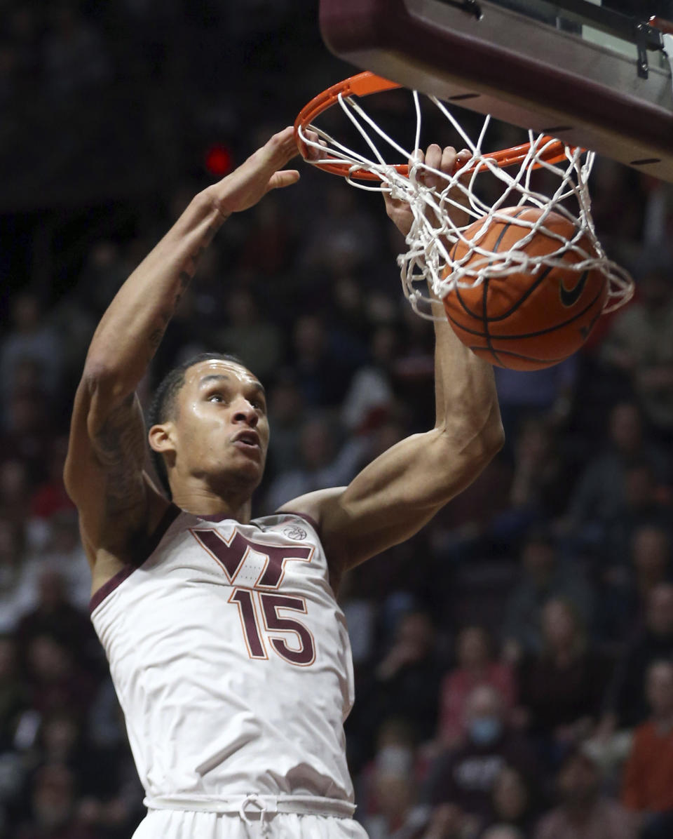 Virginia Tech's Lynn Kidd (15) dunks against North Carolina State during the first half of an NCAA college basketball game Saturday, Jan. 7, 2023, in Blacksburg, Va. (Matt Gentry/The Roanoke Times via AP)