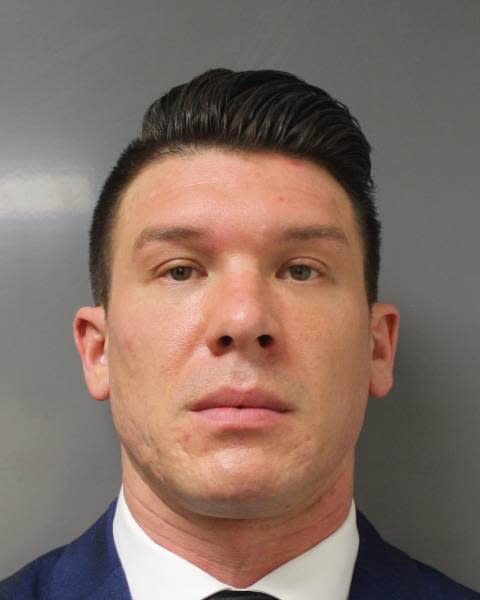 This June 6, 2020 photo provided by the Erie County District Attorney's Office in Buffalo, N.Y., shows suspended Buffalo police officer Robert McCabe. Prosecutors say McCabe was charged with assault Saturday, June 6, 2020, after a video showed him and another officer shoving a 75-year-old protester on Thursday, June 4, in a recent demonstration over the death of George Floyd in Minnesota. (Erie County District Attorney's Office via AP)