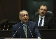 <p> Turkey's President Recep Tayyip Erdogan addresses members of his ruling Justice and Development Party (AKP), in Ankara, Turkey, Tuesday, Oct. 23, 2018. Erdogan announced details of his country's investigation into the killing of Saudi writer Jamal Khashoggi, as skepticism intensified about Saudi Arabia's account that he died accidentally in its consulate in Istanbul.(AP Photo/Ali Unal) </p>