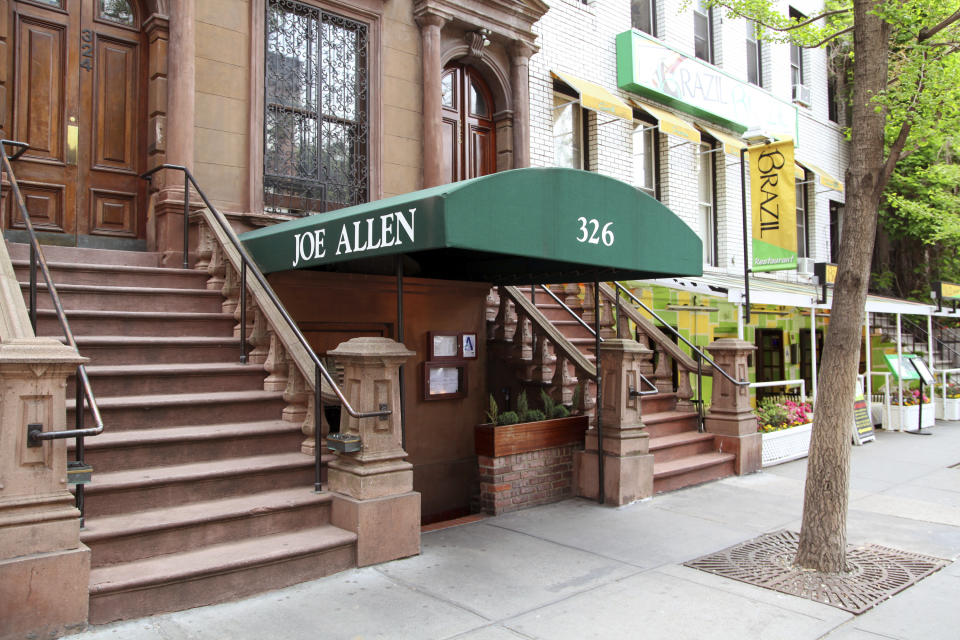 FILE - This May 21, 2014 photo shows the exterior of the Joe Allen on Restaurant Row in New York. Allen, whose Times Square-adjacent bistro which bears his name has been a decades-long draw for theater folk and where a post-Broadway drink is part of the Broadway experience, has died. He was 87. Allen died Sunday, Feb. 7, 2021, in Hampton, New Hampshire, according to Jason Woodruff, a former staffer for the Allen family of restaurants who spoke to the family. (AP Photo/Mark Kennedy, File)