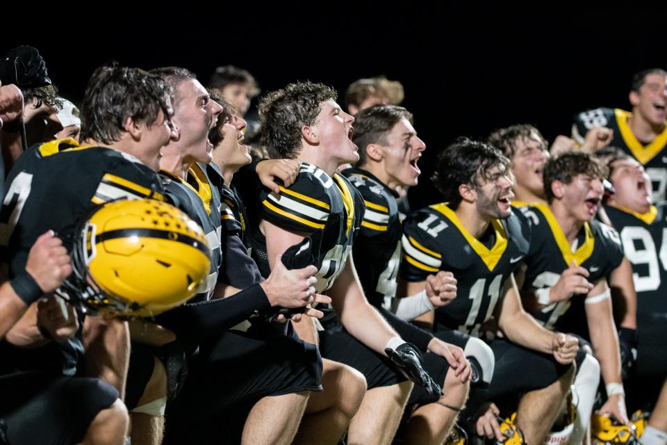 Central Bucks West players gather in the end zone for a post-game talk after their last regular season football game against Central Bucks East, on Friday, October 27, 2023, at War Memorial Field in Doylestown Borough. The undefeated Bucks beat the Patriots 24-7.