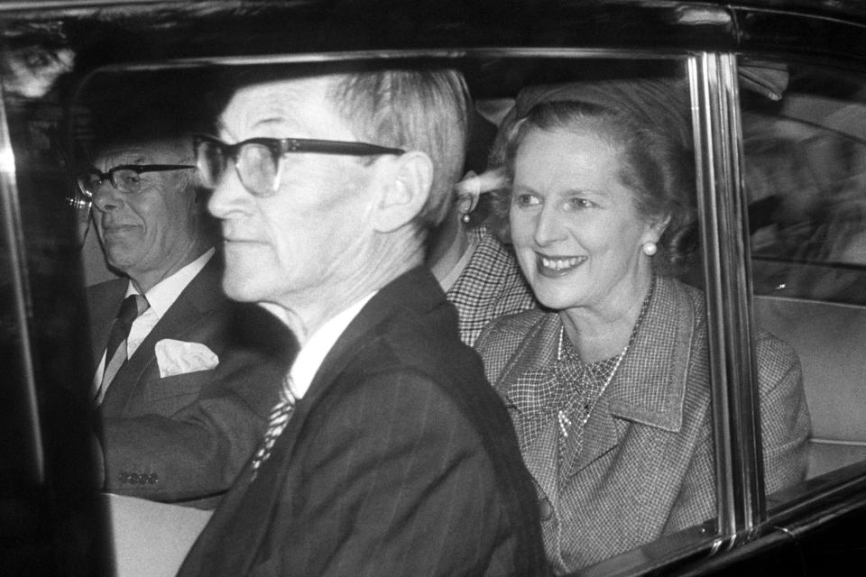 Prime Minister Margaret Thatcher, and her husband Denis, left rear, in Crathie when they joined the Queen and the Royal Family for morning service at the Parish church. The Thatchers have been staying with the Queen at nearby Balmoral castle.   (Photo by PA Images via Getty Images)