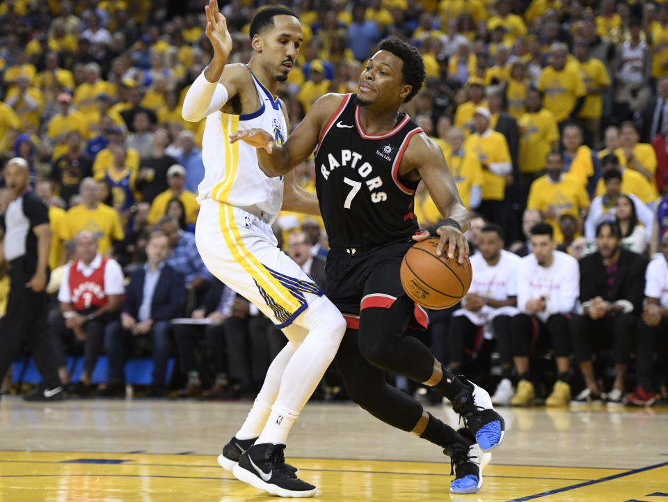 Toronto Raptors guard Kyle Lowry (7) tries to move around Golden State Warriors guard Shaun Livingston during the second half of Game 3 of basketball’s NBA Finals, Wednesday, June 5, 2019, in Oakland, Calif. (Frank Gunn/The Canadian Press via AP)