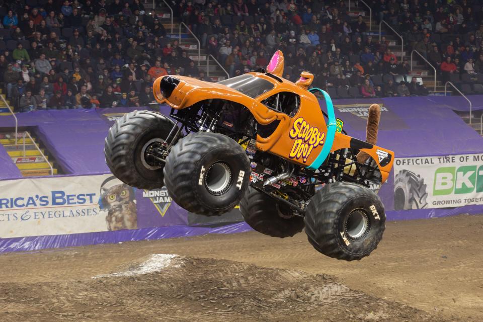 Monster Jam driver Linsey Read, who has been competing since 2016, grabs some air in her truck, Scooby-Doo.