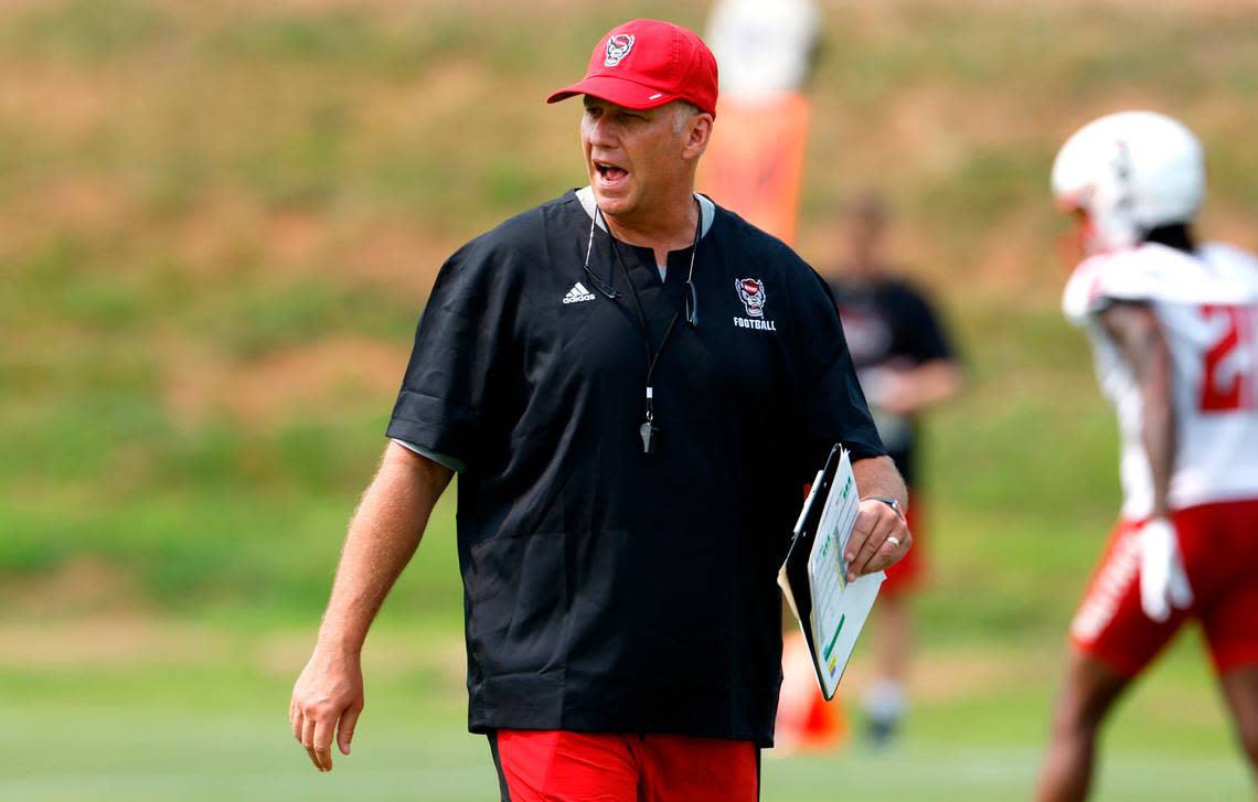 N.C. State head coach Dave Doeren yells to his team during the Wolfpack’s first fall practice in Raleigh, N.C., Wednesday, August 2, 2023. Ethan Hyman/ehyman@newsobserver.com