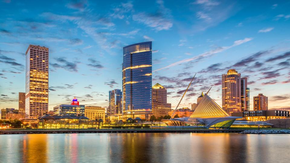 Milwaukee, Wisconsin, USA downtown city skyline on Lake Michigan at twilight.