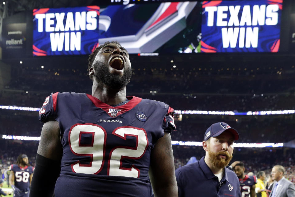 Houston Texans nose tackle Brandon Dunn (92) celebrates after an NFL wild-card playoff football game against the Buffalo Bills Saturday, Jan. 4, 2020, in Houston. The Texans won 22-19. (AP Photo/Michael Wyke)