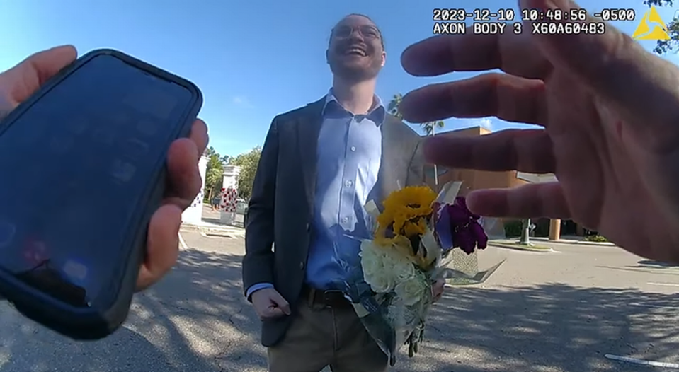 The student waited patiently for his girlfriend to arrive after the police officer called and said someone had found his wallet.