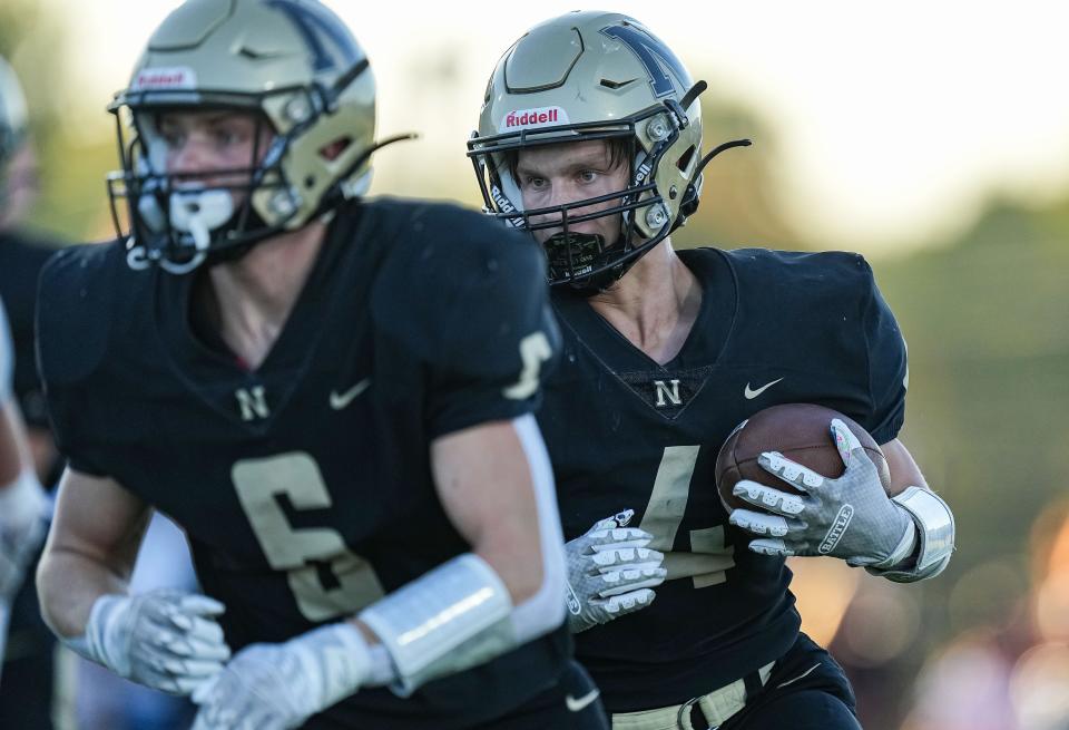 Noblesville Millers Logan Shoffner (4) rushes up the field Friday, Sept. 1, 2023, during the game at Noblesville High School in Noblesville. The Fishers Tigers defeated the Noblesville Millers, 48-22.