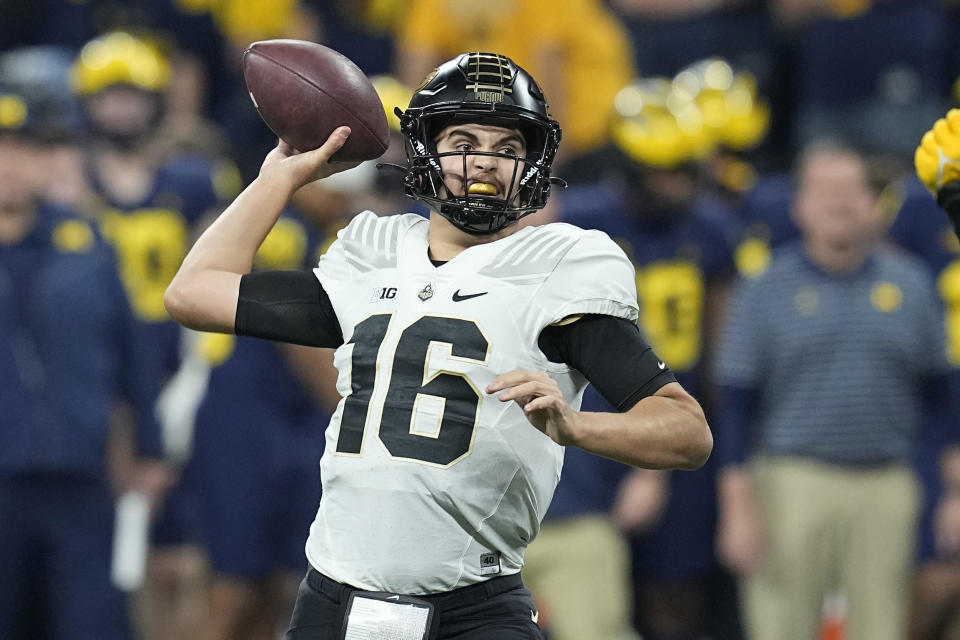 FILE - Purdue quarterback Aidan O'Connell throws during the first half of the Big Ten championship NCAA college football game against Michigan, Saturday, Dec. 3, 2022, in Indianapolis. Teams had shied away in recent years on taking a late-round flyer on quarterbacks as fewer teams kept three quarterbacks on the roster after the NFL eliminated the game-day roster exemption for an emergency third quarterback. (AP Photo/Darron Cummings, File)