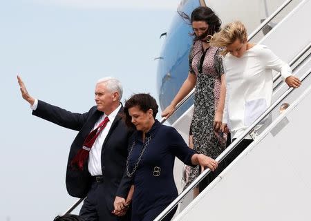 U.S. Vice President Mike Pence, his wife Karen and their daughters Charlotte and Audrey arrive at Atsugi naval air base in Ayase, south of Tokyo, Japan, April 18, 2017. REUTERS/Kim Kyung-Hoon