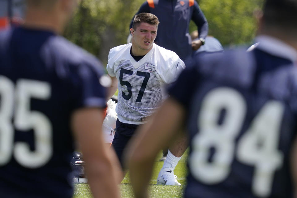 Chicago Bears linebacker Jack Sanborn (57) stretches with teammates at the NFL football team’s practice facility in Lake Forest, Ill., Wednesday, May 17, 2022. (AP Photo/Nam Y. Huh)