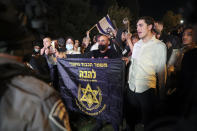 Israeli border police block members of "Lahava," a Jewish extremist group to approach to Damascus Gate to protest amid heightened tensions in the city, just outside Jerusalem's Old City, Thursday, April 22, 2021. (AP Photo/Ariel Schalit)