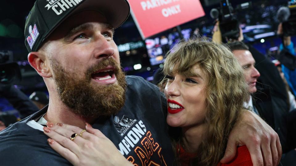 Taylor Swift pictured with her boyfriend Travis Kelce after the 2024 AFC Championship game.