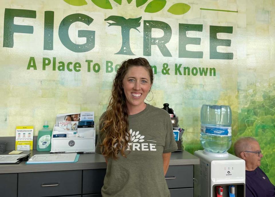 Director of Outreach Ministries Katie McIlwain welcomes homeless neighbors to Fig Tree, a homeless community outreach program sponsored by Cokesbury United Methodist Church, on June 1, 2022.