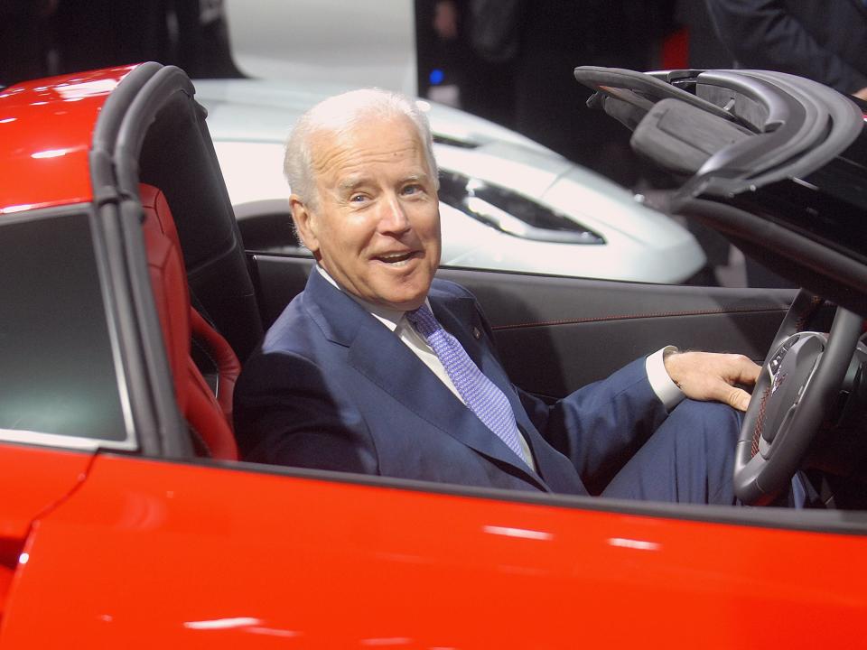 U.S. Vice-President Joe Biden sits in a Corvette at the North American International Auto Show industry preview at Cobo Hall on January 16, 2014 in Detroit, Michigan.