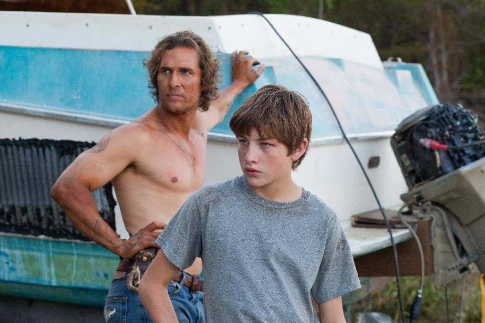 This film image released by Roadside Attractions shows Matthew McConaughey, left, and Tye Sheridan in a scene from "Mud." (AP Photo/Roadside Attractions, Jim Bridges)
