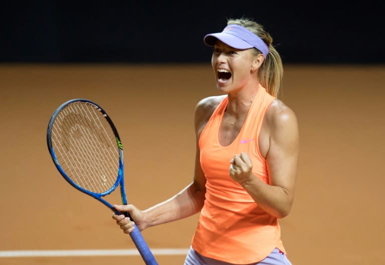 Russia's Maria Sharapova celebrates after defeating Russia's Ekaterina Makarova in their second round match at the WTA Porsche Tennis Grand Prix in Stuttgart, southwestern Germany, on April 27, 2017