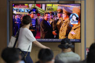 A TV screen showing a news program reporting about North Korea's missile launch with a file footage of North Korean leader Kim Jong Un, is seen at the Seoul Railway Station in Seoul, South Korea, Wednesday, Aug. 17, 2022. South Korean President Yoon Suk Yeol said Wednesday his government has no plans to pursue its own nuclear deterrent in the face of growing North Korean nuclear weapons capabilities, even as the North fired two suspected cruise missiles toward the sea in the latest display of an expanding arsenal. (AP Photo/Lee Jin-man)
