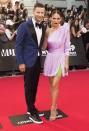 <p>The “Hockey Wives” stunner/broadcaster Maripier Morin looked beautiful in a lavendar one-shouldered frock with a peek of lime green detailing. Not to be outdone, Langlois looked on trend in a patterned blazer.<i> (THE CANADIAN PRESS/Mark Blinch)</i></p>