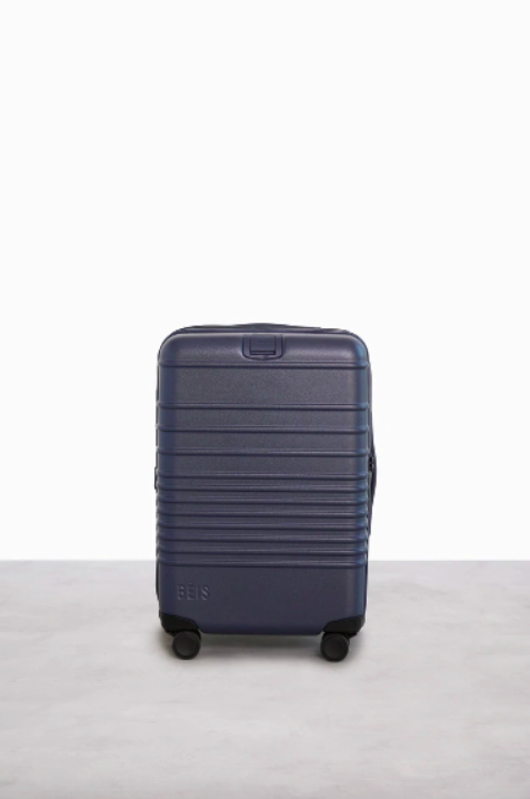 <p><a href="https://go.redirectingat.com?id=74968X1596630&url=https%3A%2F%2Fbeistravel.com%2Fproducts%2Fthe-carry-on-roller-in-navy&sref=https%3A%2F%2Fwww.cosmopolitan.com%2Fstyle-beauty%2Ffashion%2Fg26751325%2Funique-wedding-gift-ideas%2F" rel="nofollow noopener" target="_blank" data-ylk="slk:Shop Now;elm:context_link;itc:0;sec:content-canvas" class="link ">Shop Now</a></p><p>The Carry-On Roller </p><p>beistravel.com</p><p>$218.00</p><span class="copyright">Béis </span>