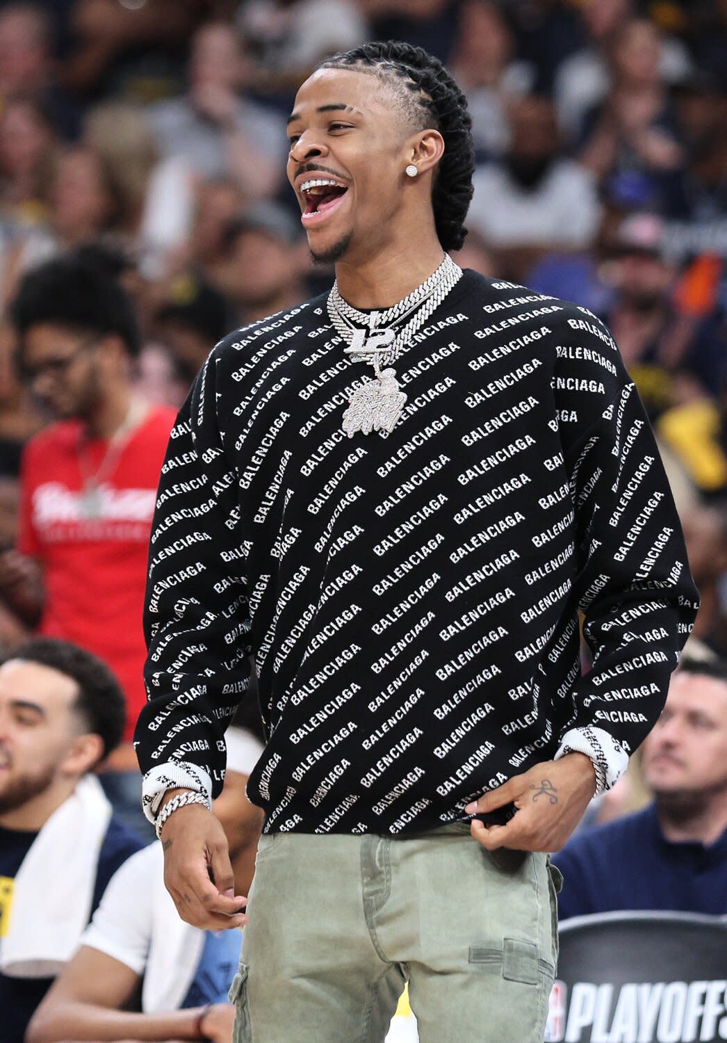 Ja Morant #12 of the Memphis Grizzlies reacts from the bench against the Golden State Warriors during the fourth quarter in Game Five of the 2022 NBA Playoffs Western Conference Semifinals at FedExForum on May 11, 2022 in Memphis, Tennessee
