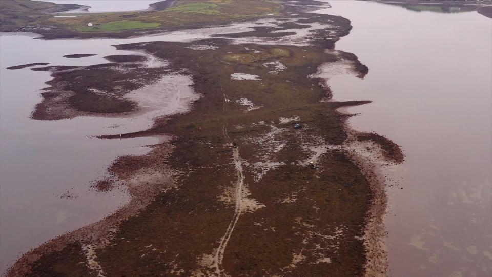 The isthmus is usually now completely flooded, but a road across it is traversable at the times of very low tides.