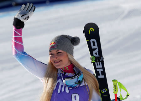 Skiing - Alpine Skiing World Cup - Women's Downhill - Cortina d'Ampezzo, Italy - January 20, 2018. Lindsey Vonn celebrates her first place. REUTERS/Stefano Rellandini