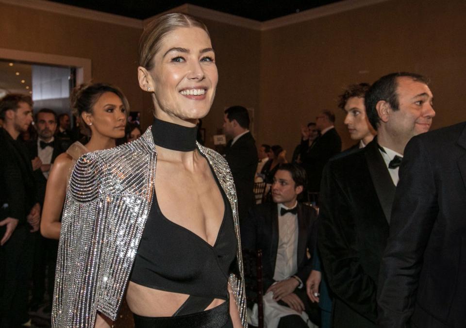 Rosamund Pike arrives during the 76th Golden Globe Awards in 2019. She's nominated again at this year's Globes, which will be a virtual affair.