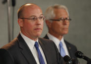 Johnson County District Attorney Steve Howe talks to the media as U.S. Attorney Berry Grissom, right, listens, during a news conference in Overland Park, Kan., Tuesday, April 15, 2014. Kansas prosecutors filed state-level murder charges Tuesday, April 15, against white supremacist, Frazier Glenn Cross, who is accused in a shootings that left three people dead at two Jewish community sites in suburban Kansas City on Sunday. (AP Photo/Orlin Wagner)