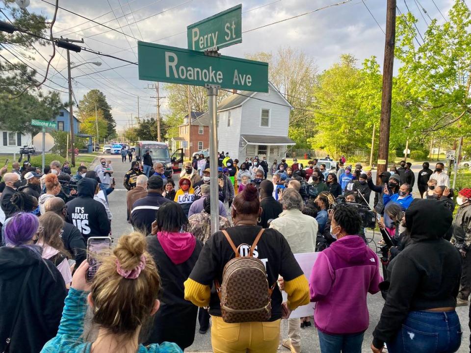 Protestors in Elizabeth City gather at the corner of Roanoke and Perry where Andrew Brown Jr. died Wednesday morning after being shot by Pasquotank County sheriff’s deputies.