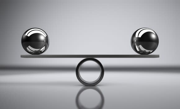 Two balls balancing each other