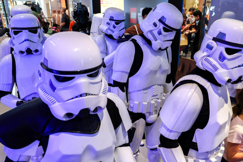 Fans dressed as Stormtroopers march through Bangkok on May 4.