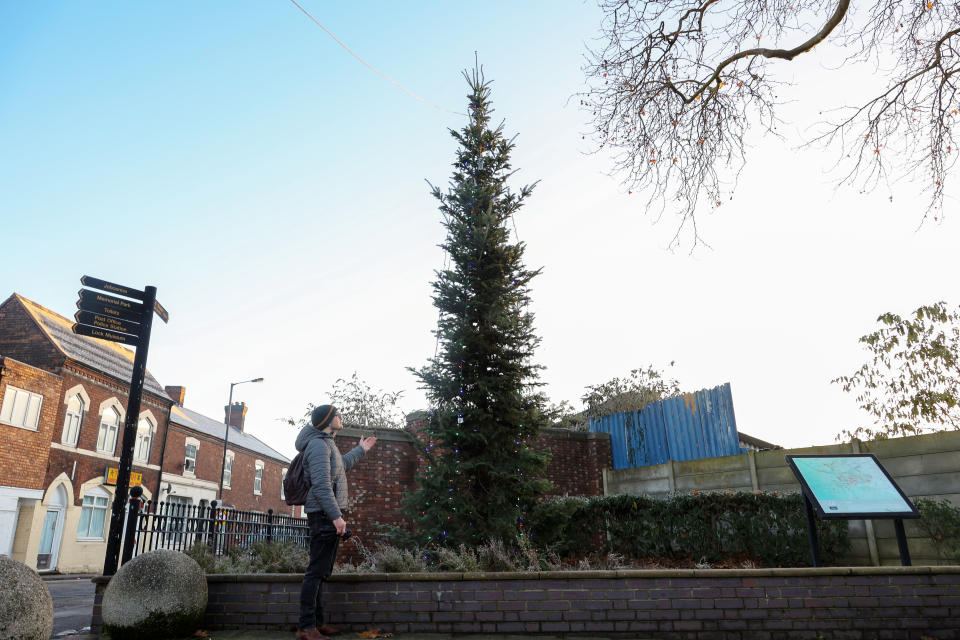 The skinny Christmas tree on the Lock Maker's Memorial in Willenhall, Wolverhampton, was compared to a beanstalk. (SWNS)