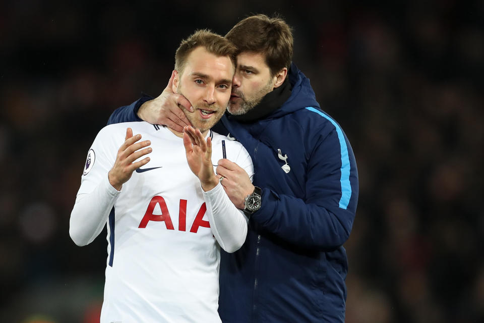 LIVERPOOL, ENGLAND - FEBRUARY 04: Christian Eriksen of Tottenham Hotspur and Mauricio Pochettino head coach / manager of Tottenham Hotspur celebrate at full time during the Premier League match between Liverpool and Tottenham Hotspur at Anfield on February 4, 2018 in Liverpool, England. (Photo by Robbie Jay Barratt - AMA/Getty Images)