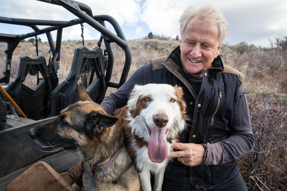 Graham Russell of Air Supply poses for a photograph with his two dogs at his home in Kamas on Monday, Nov. 5, 2018.