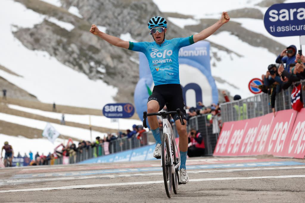  EOLOKometas Italian rider Davide Bais celebrates as he crosses the finish line to win the seventh stage of the Giro dItalia 2023 cycling race 218 km between Capua and Gran Sasso dItalia on May 12 2023 Photo by Luca BETTINI  AFP Photo by LUCA BETTINIAFP via Getty Images 